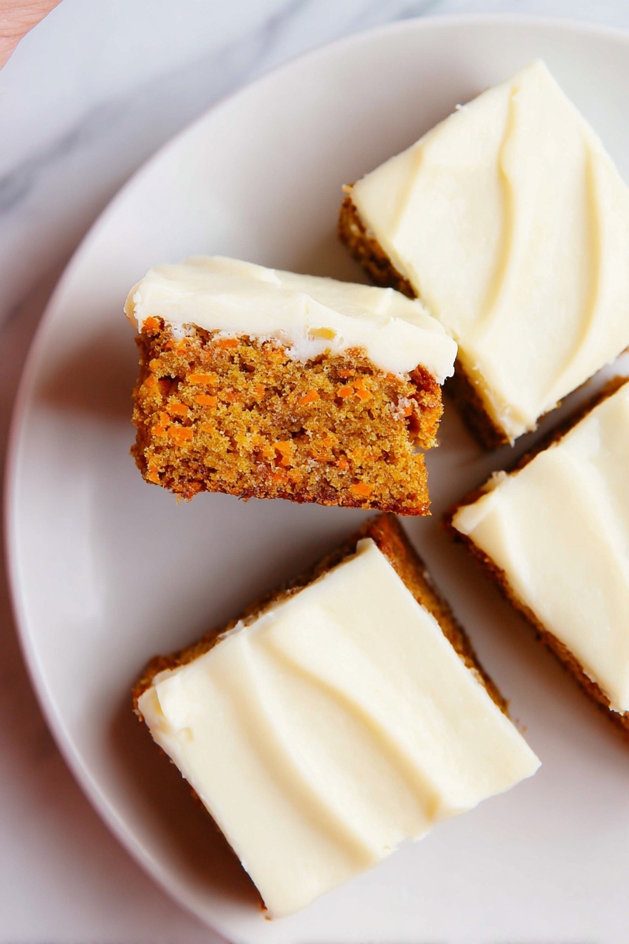 The image shows three square pieces of carrot cake with one piece lifted in the center. Each piece has one layer of moist orange-brown cake topped with a smooth, thick layer of white cream cheese frosting. The frosting is spread evenly on the top with soft swirls. The pieces sit on a white plate, which rests on a white marbled texture background. The lifted piece clearly shows the light orange crumb texture of the cake and the creamy frosting on top. photo taken with an iphone --ar 2:3 --v 7